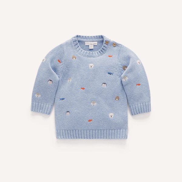 Pull brodé enneigé